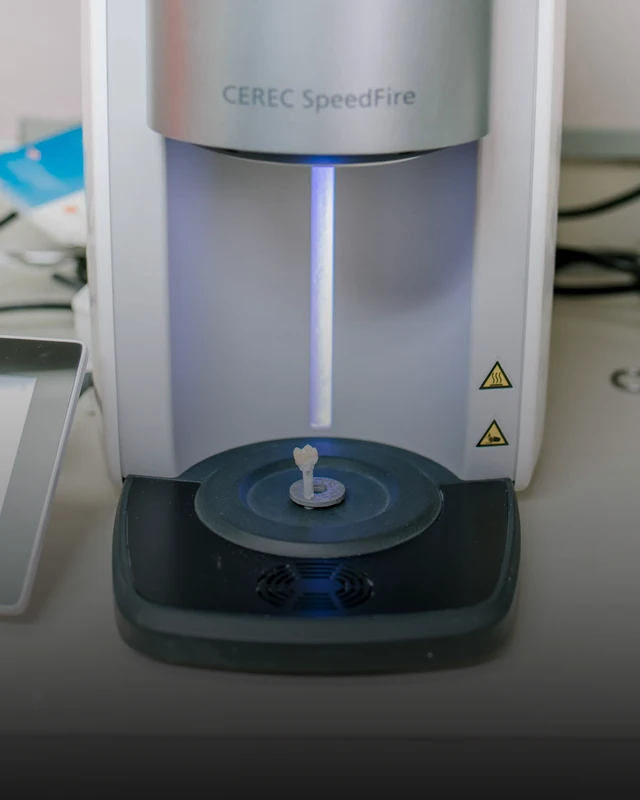 a photo of the CEREC SpeedFire machine creating a new tooth for an implant
