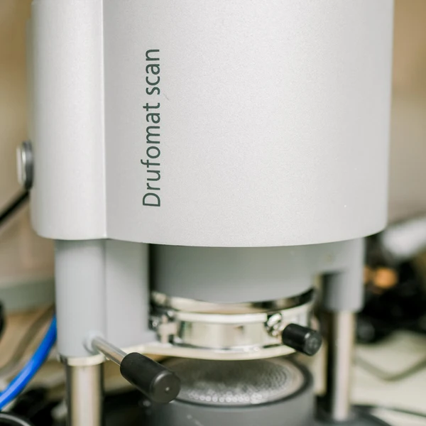 a piece of machinery used in the dental office is seen zoomed in on