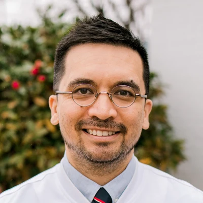 Dr. Jared Kent, the main dentist at LaGrange Dentistry, is seen smiling for his head shot