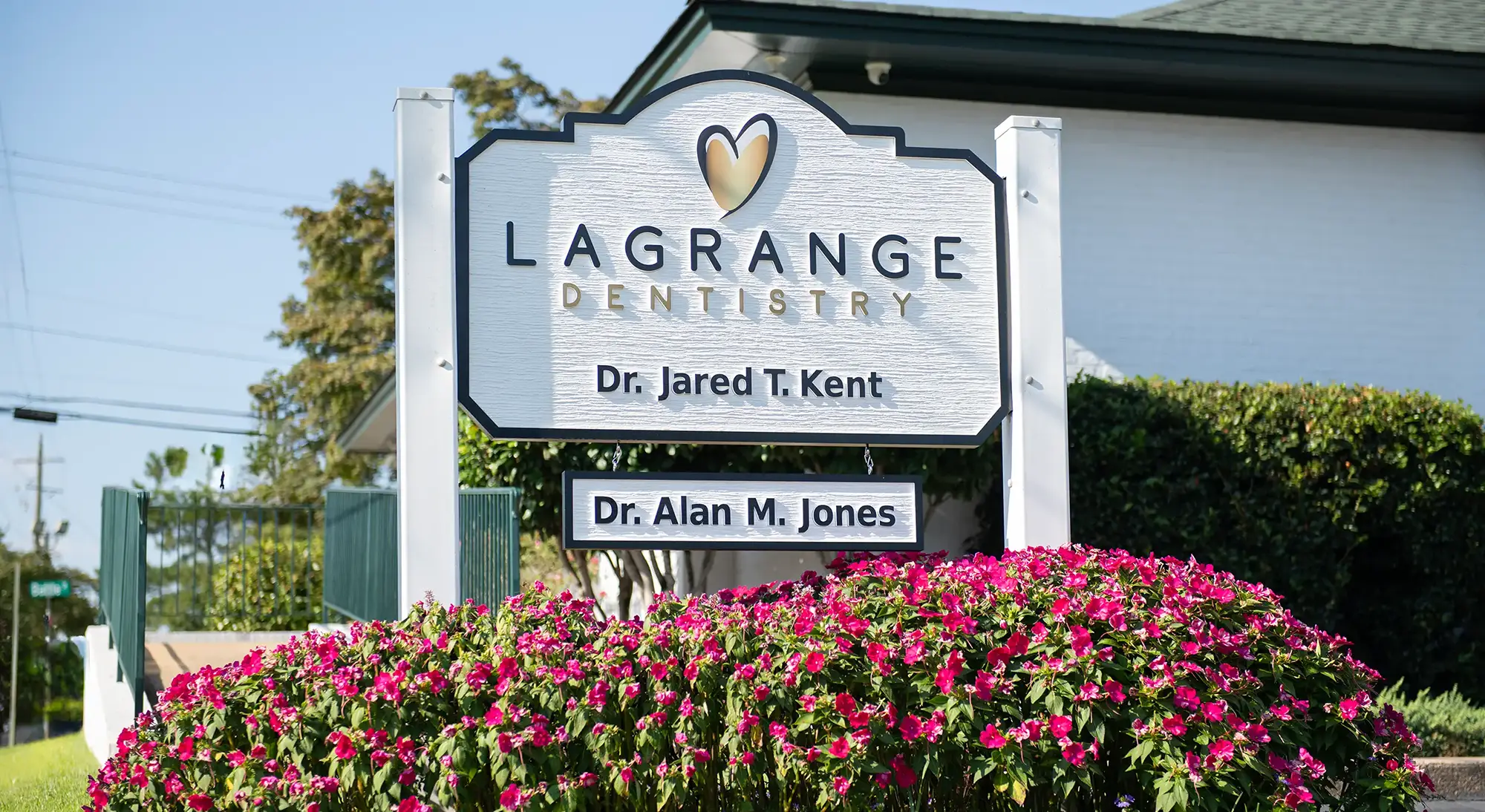 Dentist LaGrange GA Front Sign With PINK Flowers Office Tour